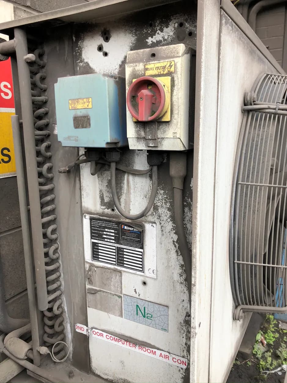 Aging chiller system in need of upgrade showing wear and outdated components